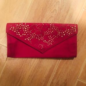 AE cranberry clutch bag